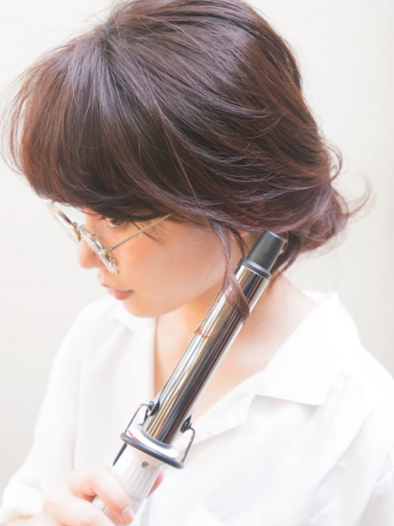 やけどをしないように顔から離して