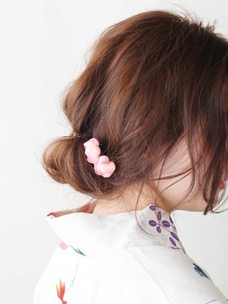 今にも崩れそうなスタイルは色っぽさ抜群