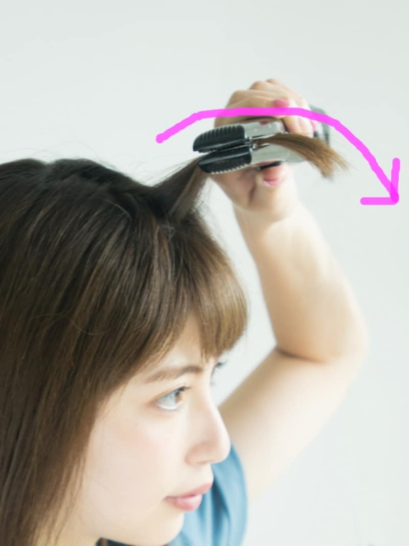 こうする事でふんわりした前髪に