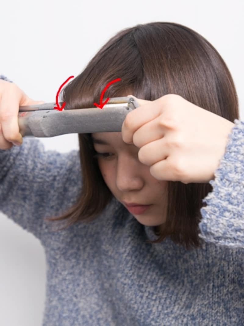 引き出した毛に平行にはさむ