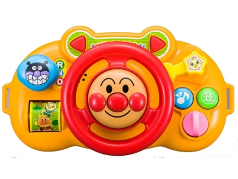 仕掛けがいっぱいのハンドル。ボタンを押すと「アンパンマンのマーチ」が流れます