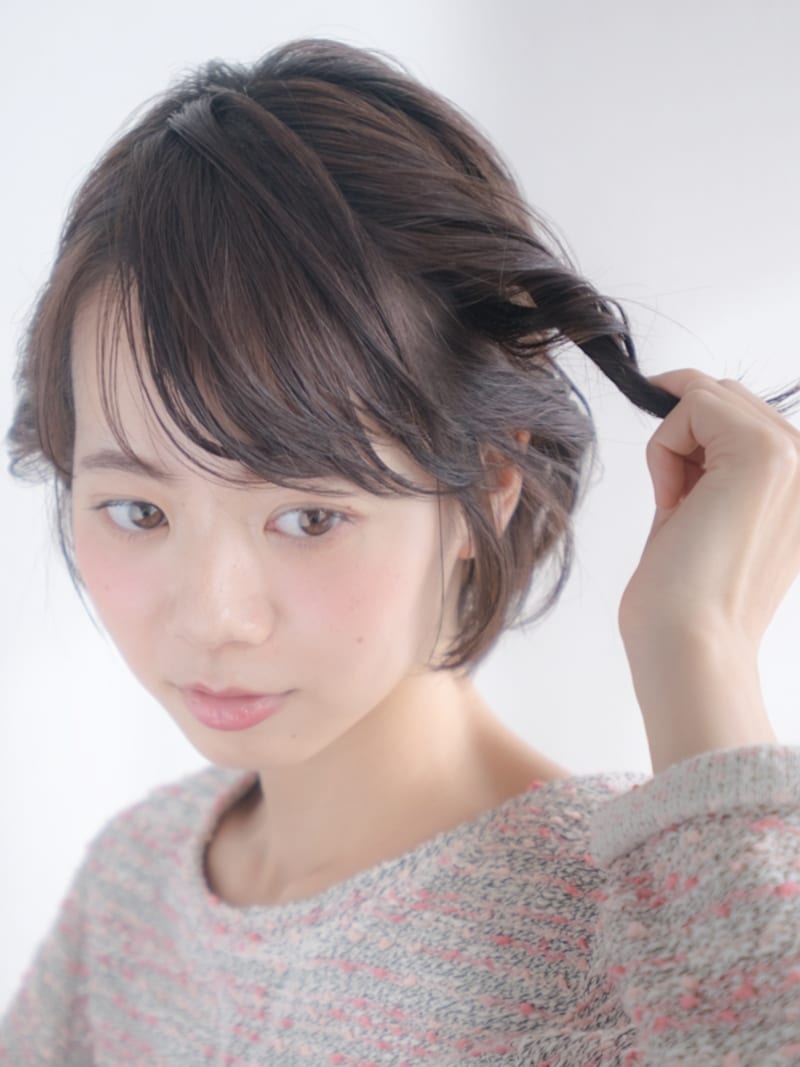 後ろに向かってねじる