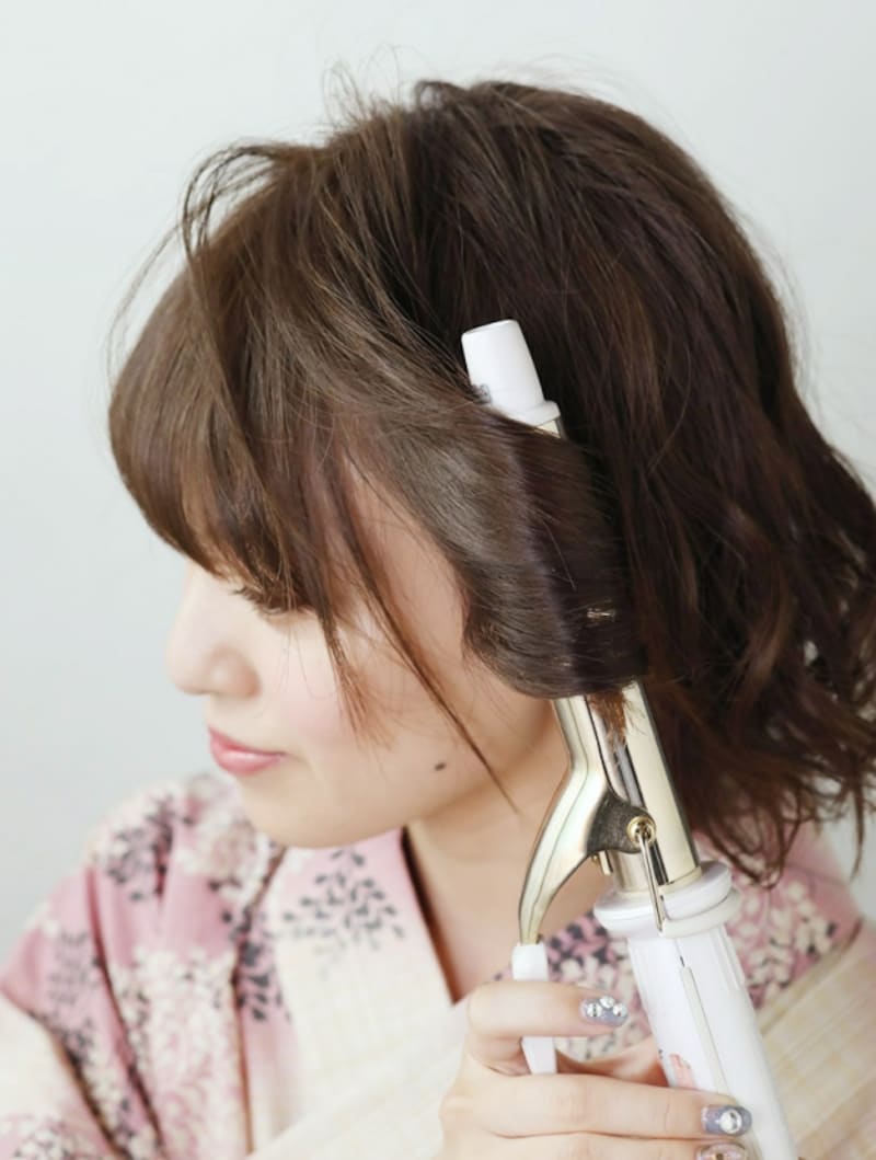 髪の根元までしっかりと巻く