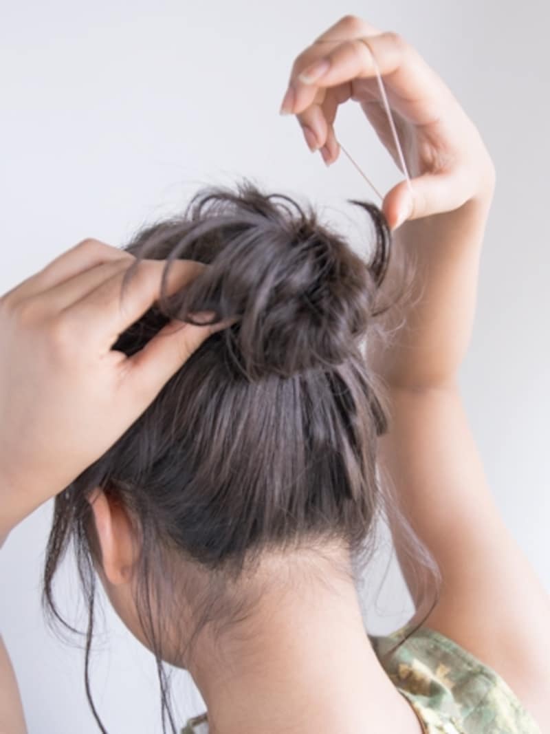 シリコンゴムを大きく開いて根元にもう一度つける