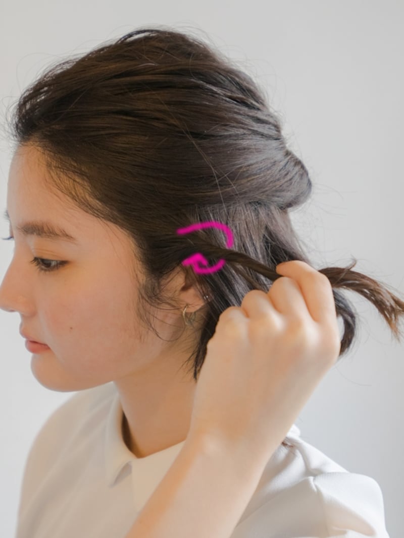 後ろに向きに2回転ねじる