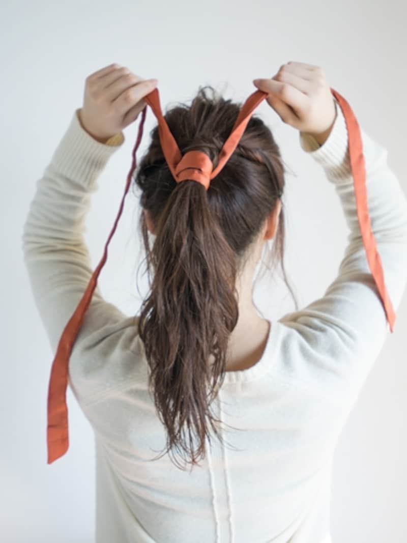 きつめに引っ張り、たるみをとる