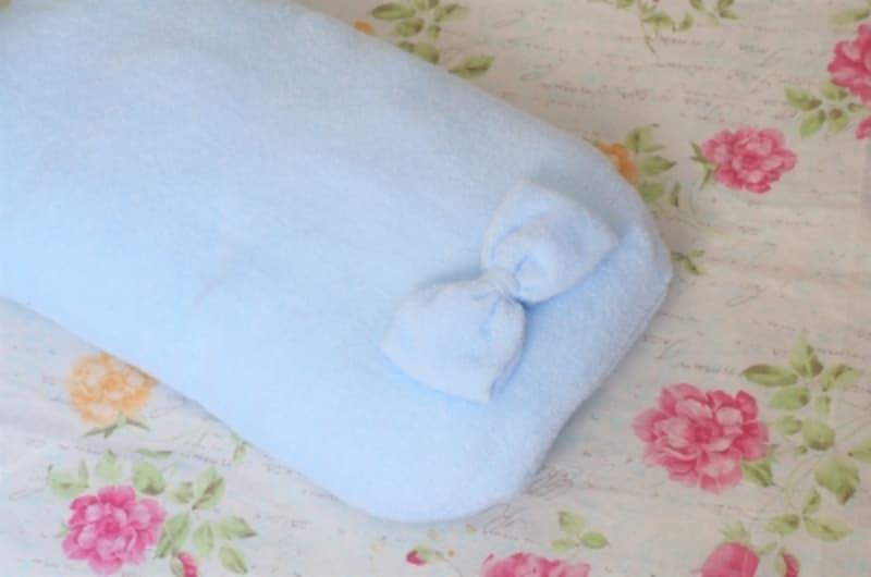 タオルの端切れで作ったリボンをトッポンチーノに飾ってみました。