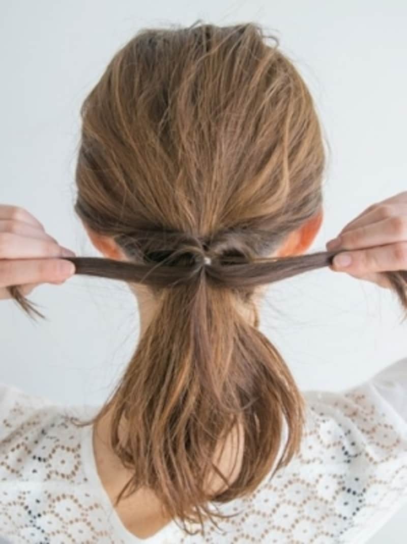 強めに引っ張る