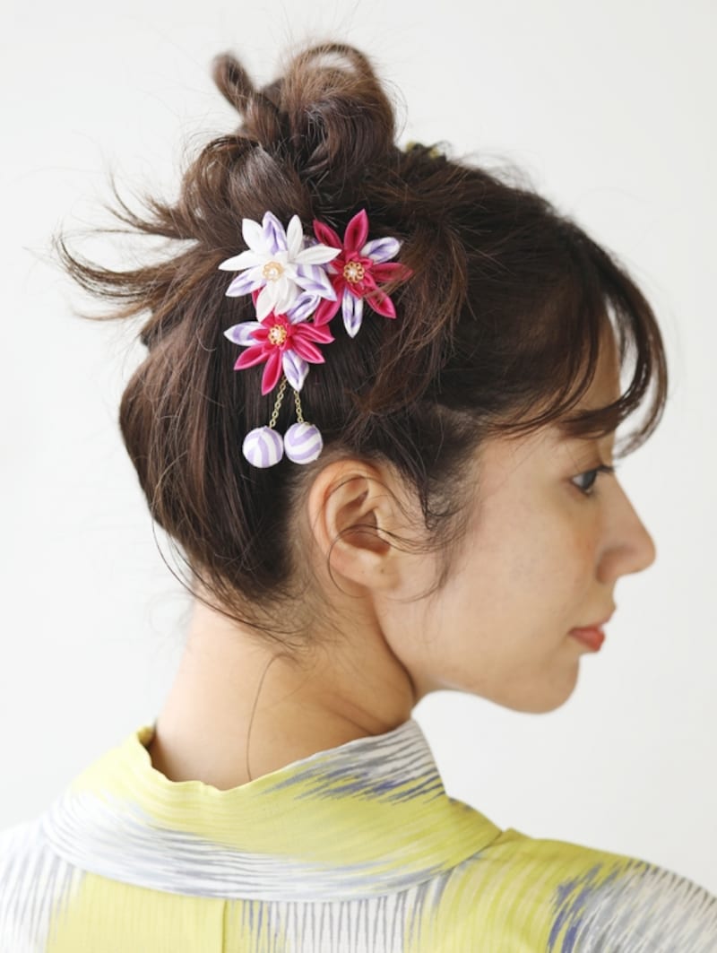 毛先をしっかりと外ハネに巻く