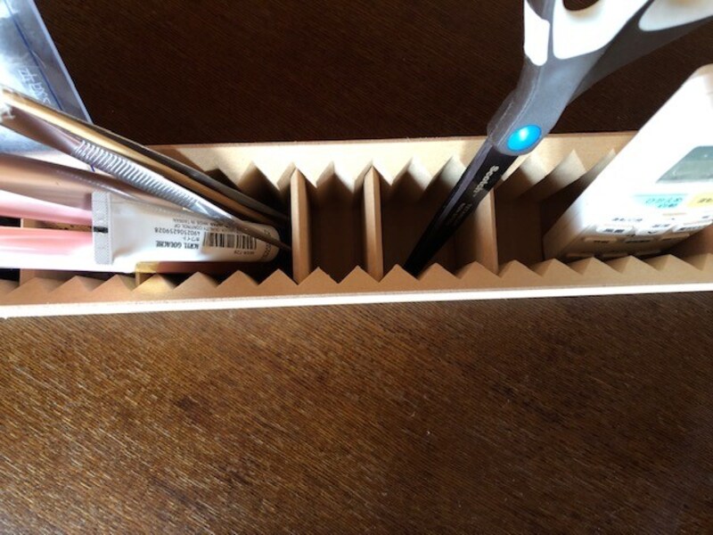 仕切りを動かせば、自分好みのスタンドに