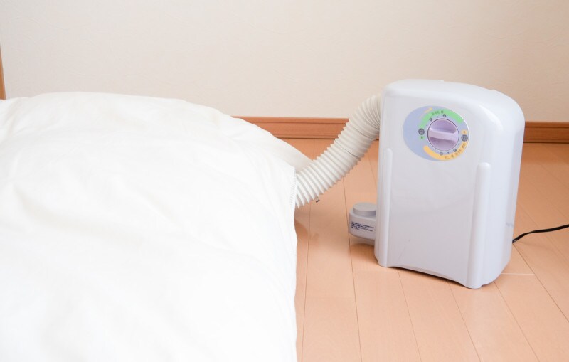 布団乾燥機　冬の布団の干し方