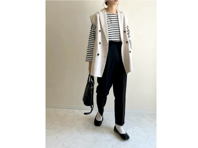 羽織るだけで下半身をカバーしつつすらっと見せてくれるベスト 出典:WEAR