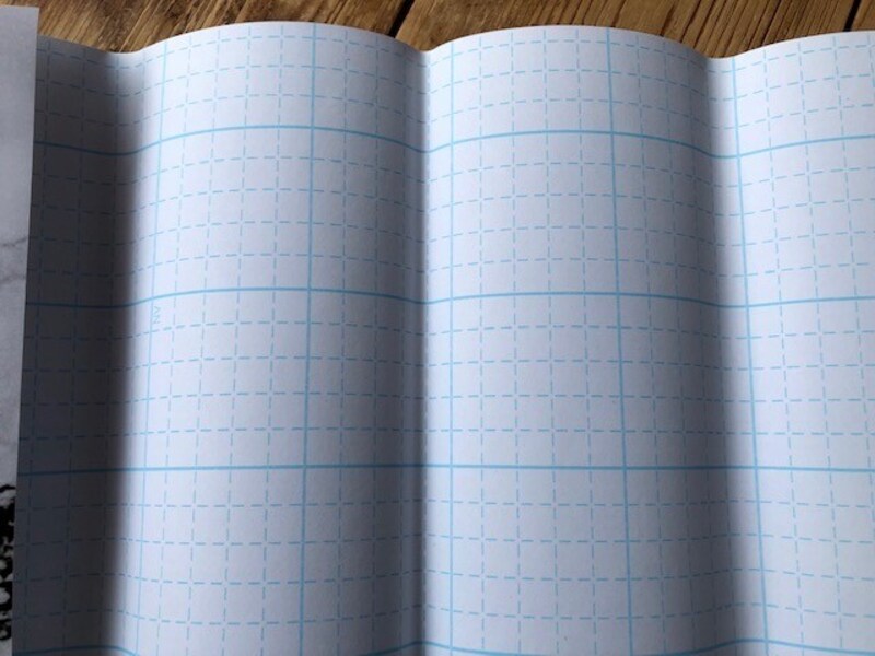 ダイソーの「大理石柄リメイクシート(ホワイト)」の裏側は升目になっている