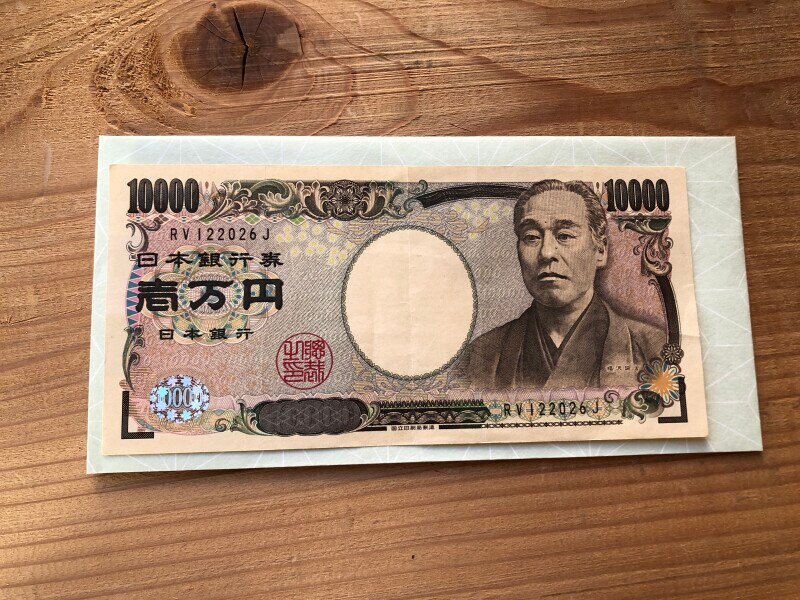 キャンドゥで買える「万型封筒　小粋パステル　3枚」は1万円を折らずに入れられる