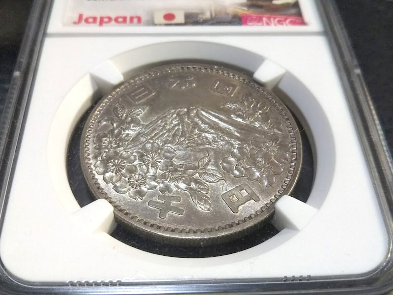 価格高騰中の日本の記念貨幣「1964年東京五輪の1000円銀貨」（筆者所有）