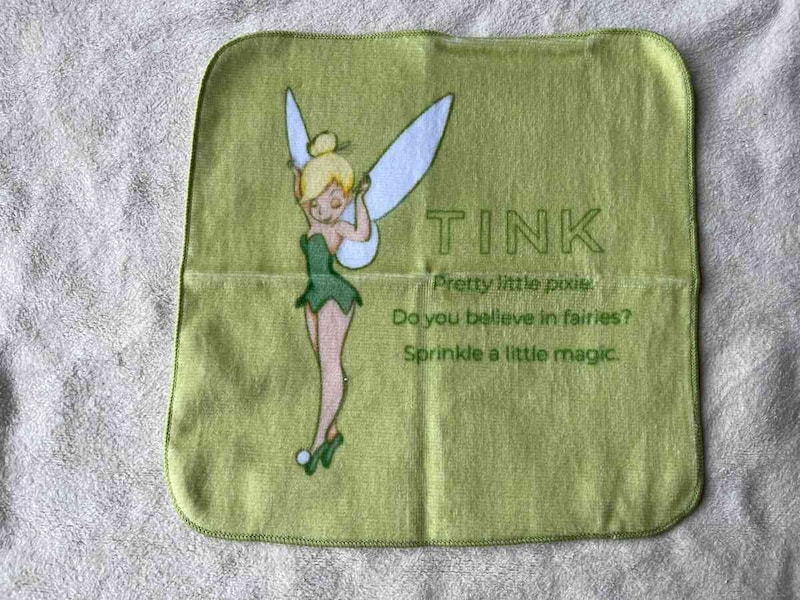 スリーピーの「ハンドタオル、A（ティンカー・ベル）」の素材は綿100％