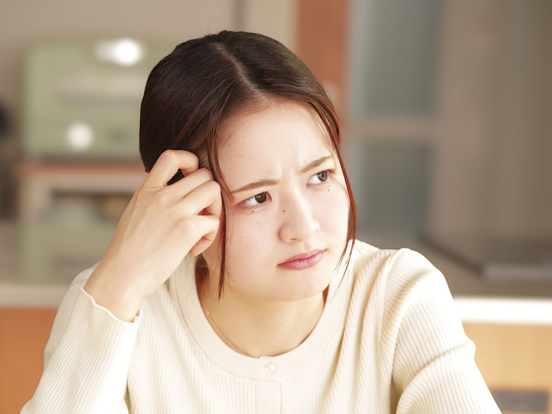 不満そうな女性