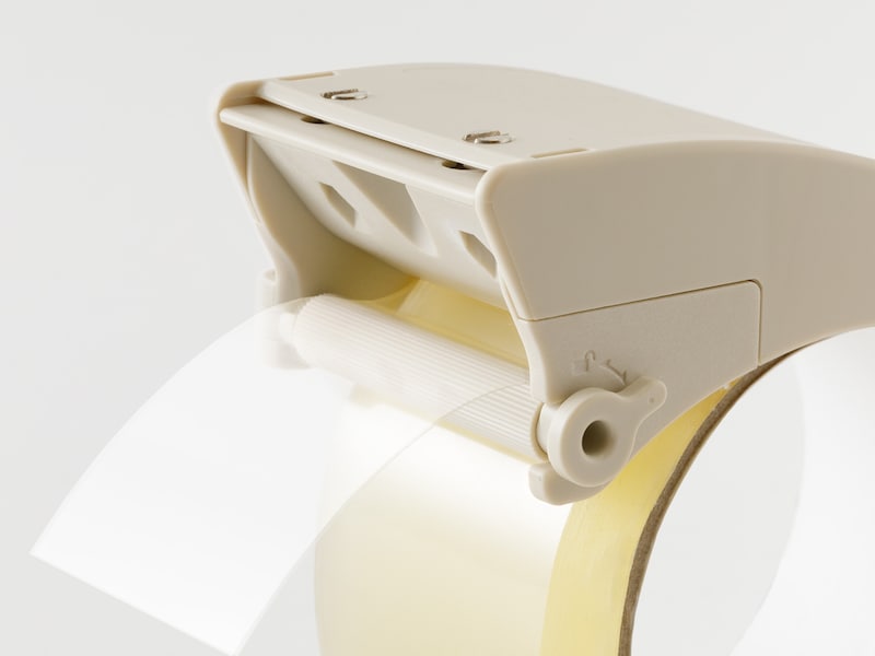 テープ端を保持するローラー付き