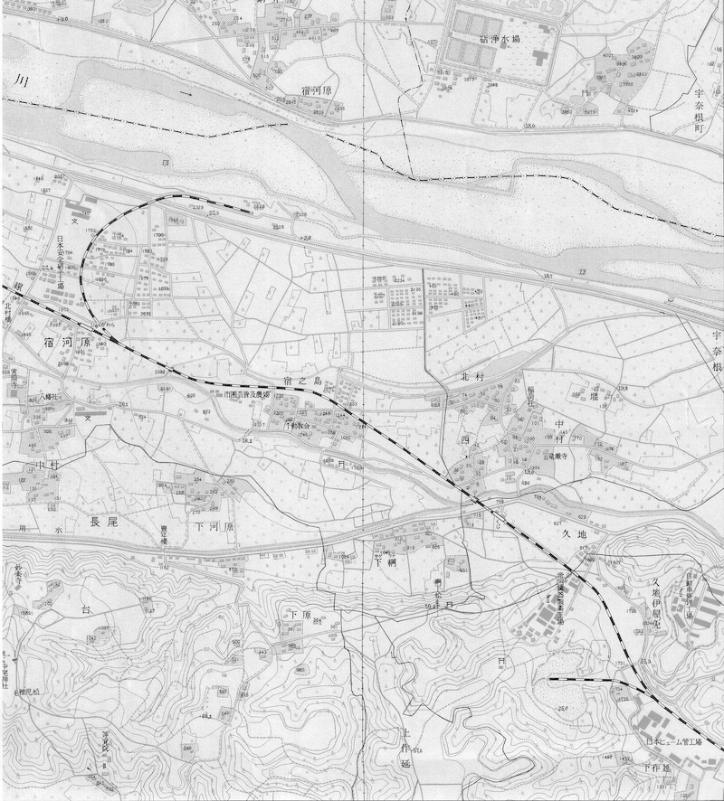 左上に宿河原の砂利採取線、右下に日本ヒューム管川崎工場の専用側線が描かれている（※画像：1955年修正測量「登戸」国土地理院地形図部分）