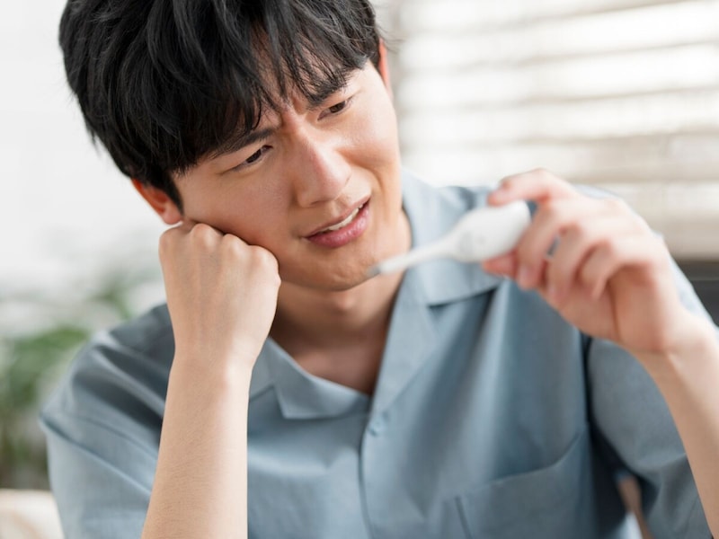 発熱している人