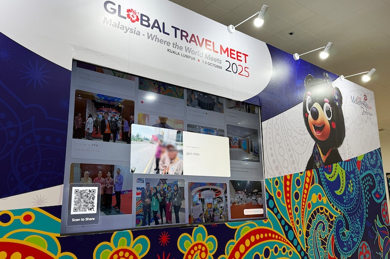 「GLOBAL&nbsp;TRAVEL&nbsp;MEET」の会場内に設けられた写真共有コーナー。参加者が自分でアップロードするスタイル