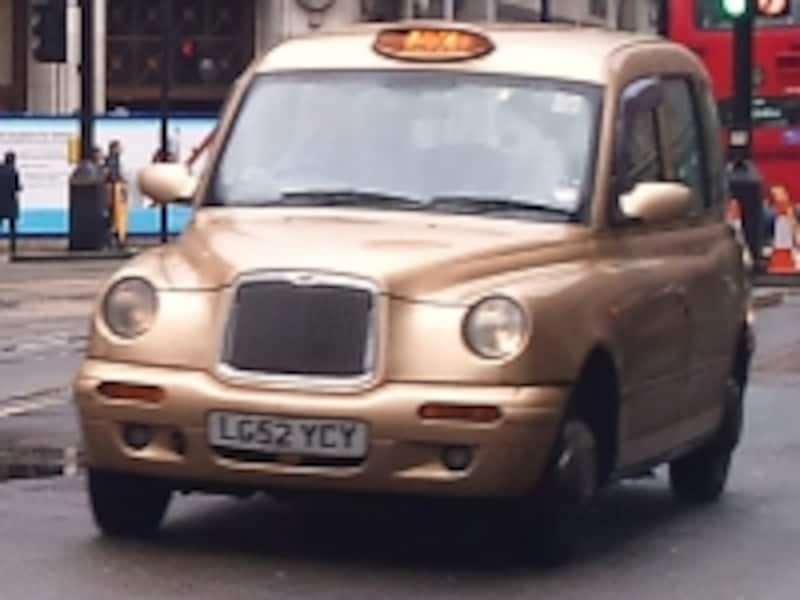 Black cab in gold