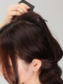 根元を軽くひっぱる