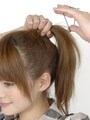TOPで結んだゴムに重ねて結ぶ