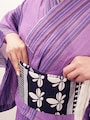帯がきつくて苦しい時の直し方3.両脇に差し込むだけでOK！解ける心配もなく、結び目が当たることもないので快適です。