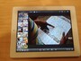 新型iPadで新アプリ「iPhoto」を開いたところ。女性が地図を見ているのがわかるだろうか