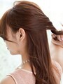 鏡を見ながらトップのバランスをチェック
