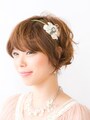 ヘアアイロンで少量ずつカール