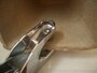 ハトメパンチで挟む