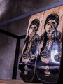 澤田洋史さんの顔をデザインしたスケートボード