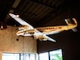  飛行機のオブジェは、「旅」をキーワードにさまざまな書籍や雑貨が集合していた246CAFE  BOOKの書店の天井に飾られていたもの。青山一丁目での10年の記憶を伝えます。