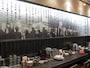 カウンターの壁に書かれた「博多屋台味」の文章
