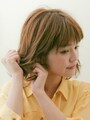 毛先から握るようにつける
