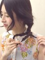 3本の毛束を左側に寄せ合わせてさらに三つ編みに