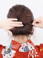 くるくるとロール状に巻き込みピンで固定