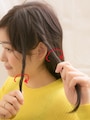 両毛束ともに後ろにねじる