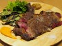 アメリカ産骨付きリブロースの薪焼き 1,000円/100ｇ
