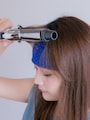 コテを挟んだら毛先まで滑らせて