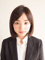 ハーフアップの結び目に毛束を引っ張る
