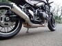 Z900RSのマフラー。車体下に大きな膨脹室を抱えるのは最近のバイクに採用されることが多い