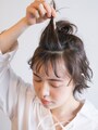 前髪を薄めに分けとる
