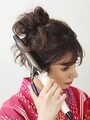 毛先を26ミリのコテで巻く