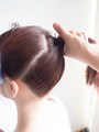 緩まないように逆手で押さえる