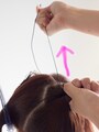 ゴムをギュッと引き上げて一回転