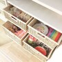 プラスチック食器やお弁当箱などはかごに入れてざっくり収納