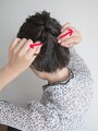毛先を左右に引っ張り締める